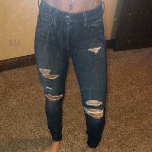 High-Rise Ripped Jeans